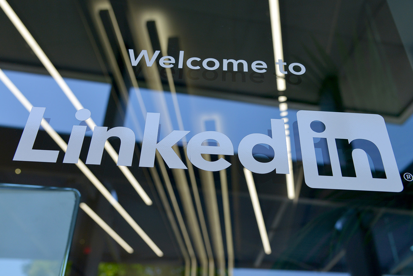 LinkedIn tips for financial company - LinkedIn logo on window
